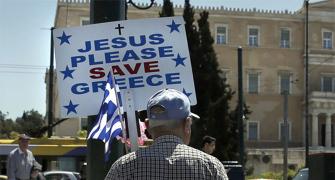 Greece licks wounds after bailout vote
