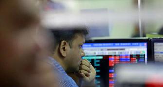 Markets end lower on selling in banking, IT shares
