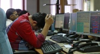 Sensex sinks 1,062 points on selling in index majors