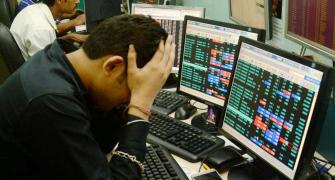 Sensex ends manic Monday down 1,546 points