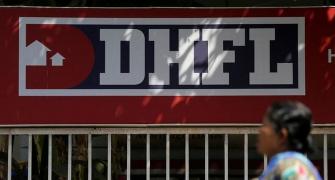 Peeved Piramal may quit race for DHFL over Adani's bid