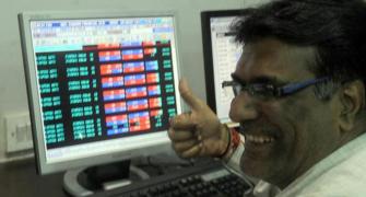 Sensex climbs over 560 pts; Nifty tops 22,300-level