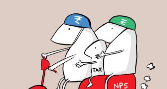 Ask rediffGURU: 'Will my wife face tax issues if...?'