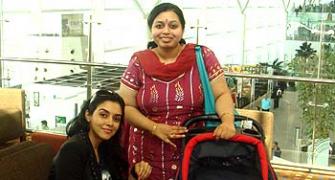 Spotted: Asin, Bobby and Neil at Delhi airport