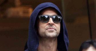 PIX: Hrithik exits hospital, waves to his fans