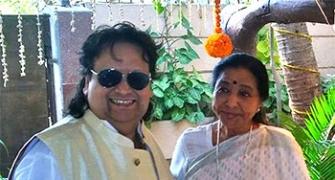 PIX: Asha Bhosle celebrates Saraswati Puja with Bappi Lahiri