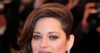 Marion Cotillard reacts to link up rumours with Brad Pitt
