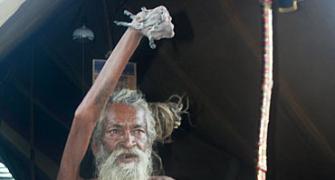 'Hands up' sadhu does it for world peace