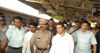 Image: Rahul defies Sena, takes Mumbai local train