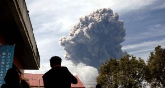After tsunami and quake, volcano erupts in Japan