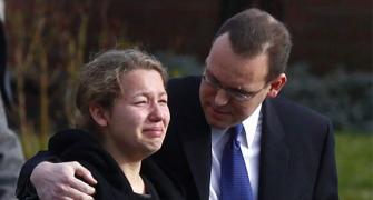Connecticut weeps as it buries 6-yr-olds killed in school
