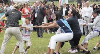 In PHOTOS: Michelle Obama in a tug of war in London