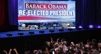 Obama beats Romney, gets second term
