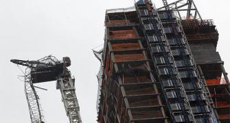 Sandy batters NY: Crane dangles from high-rise, cars float