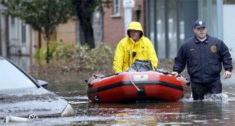 Rescue work on after Sandy's DESTRUCTION