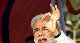 Modi takes a dig at PM over FDI in retail