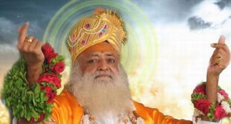 Asaram misses flight after his supporters clash with media