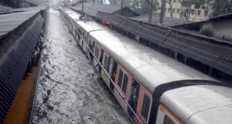 Heavy rains hit train services, make Mumbai crawl