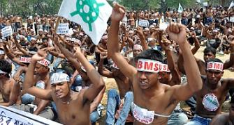 Assam: Students go topless, demand rehab of riot-victims