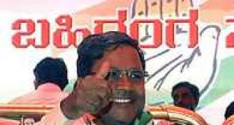 K'taka: Siddaramaiah inducts 28 ministers, keeps tainted away