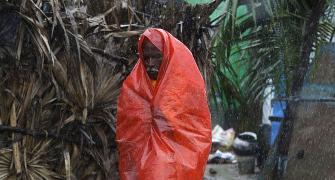 Phailin weakens; over 8 lakh in camps, losses pegged at Rs 2500 cr