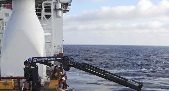 Malaysia to release MH370 report; plane search goes on