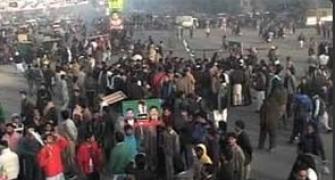 Lahore shuts down as Pakistan opposition holds anti-govt protests