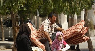 Israel gets ready for invasion; thousands flee Gaza