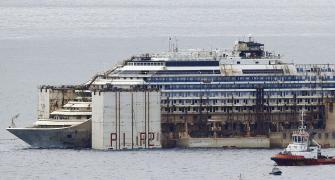 Costa Concordia completes final voyage to scrap yard