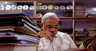 Modi gets to work soon after taking over as PM