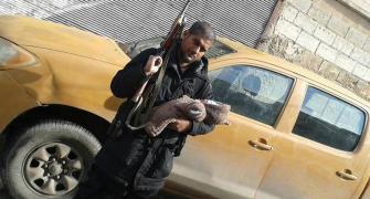 Indian-origin IS militant poses with his baby and AK-47 on Twitter