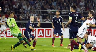 Euro qualifier: Mueller double helps Germany edge past Scotland