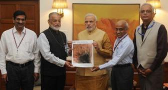 ISRO presents Mangalyaan's first photo to PM Modi
