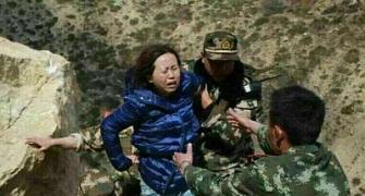 Tibet quake toll rises to 20; forecast of rain, snow