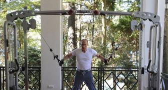 PHOTOS: Macho man Putin pumps iron. And he has competition