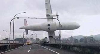 Photos: 15 killed, 30 missing after Taiwan plan crashes in river