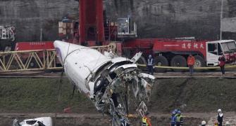 Taiwan pilot's body found clutching joystick of crashed plane