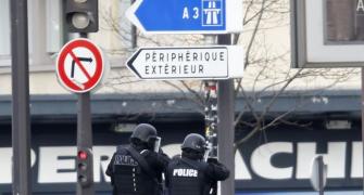 Female suspect in French hostage situation 'on the run'