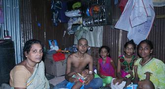 In a dark, dingy, slum, families cope with Mumbai's hooch tragedy