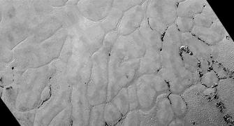 Stunning NASA image reveals Pluto's mysterious icy plains