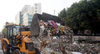Battle of brooms: AAP, BJP lock horns while cleaning Delhi's garbage
