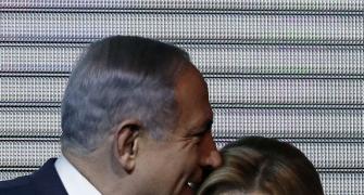Israel's Netanyahu claims 'huge' victory after exit polls show near tie