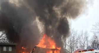 US: 9 killed as plane crashes into apartment in US