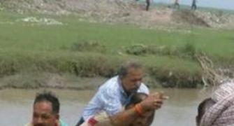 Photo of cop carrying BJP MLA on back goes viral