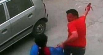 Man caught on camera dragging woman before rape surrenders
