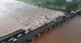 Bridge on Mumbai-Goa highway washed away, 2 dead, 22 missing