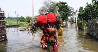 Bihar flood toll reaches 156, twins born on boat