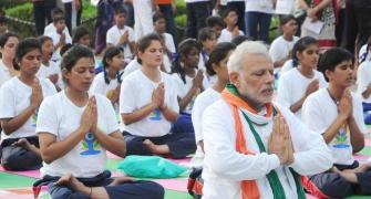 PM, 57 ministers to mark Yoga Day events across India