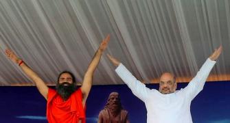 PIX: Smriti, Rajnath, Naqvi roll out the yoga mat
