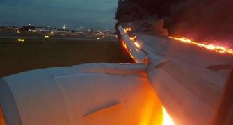 Narrow escape for 240 passengers as Singapore Airlines jet catches fire
